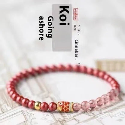 Purple cinnabar and strawberry quartz bracelet with peach blossom and koi beads measuring 19 cm