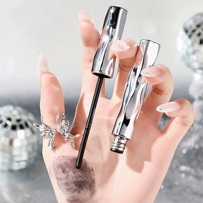 Waterproof steel tube mascara in black and brown shades with optional eyelash curler.
