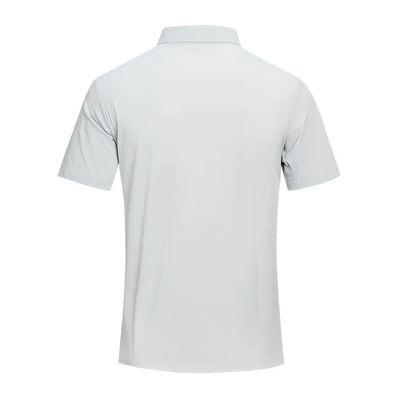Quick-drying breathable polo shirt in solid colour with short sleeves and regular fit