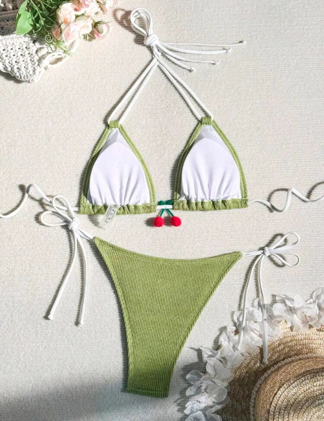 Women's sexy wind style bikini swimsuit in a solid colour, showing backless briefs design.