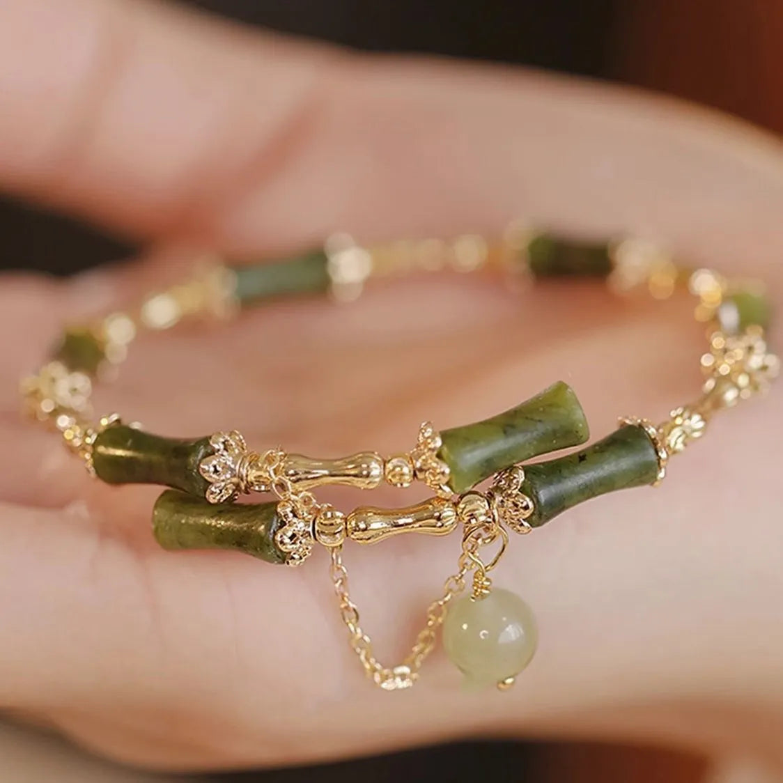 Plum wine coloured bamboo beaded bracelet with baking varnish finish on wrist