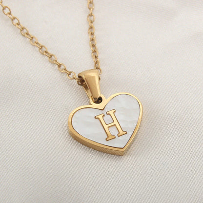 Personalized heart-shaped white shell necklace with adjustable clavicle chain, a stylish and versatile jewelry piece for women
