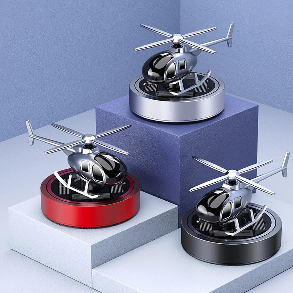 Solar helicopter car air freshener with rotating propeller and metal construction