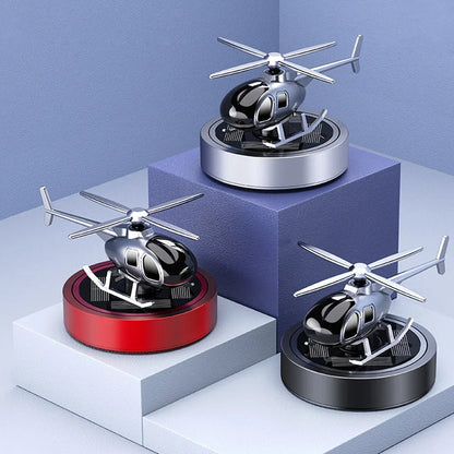 Solar helicopter car air freshener with rotating propeller and metal construction