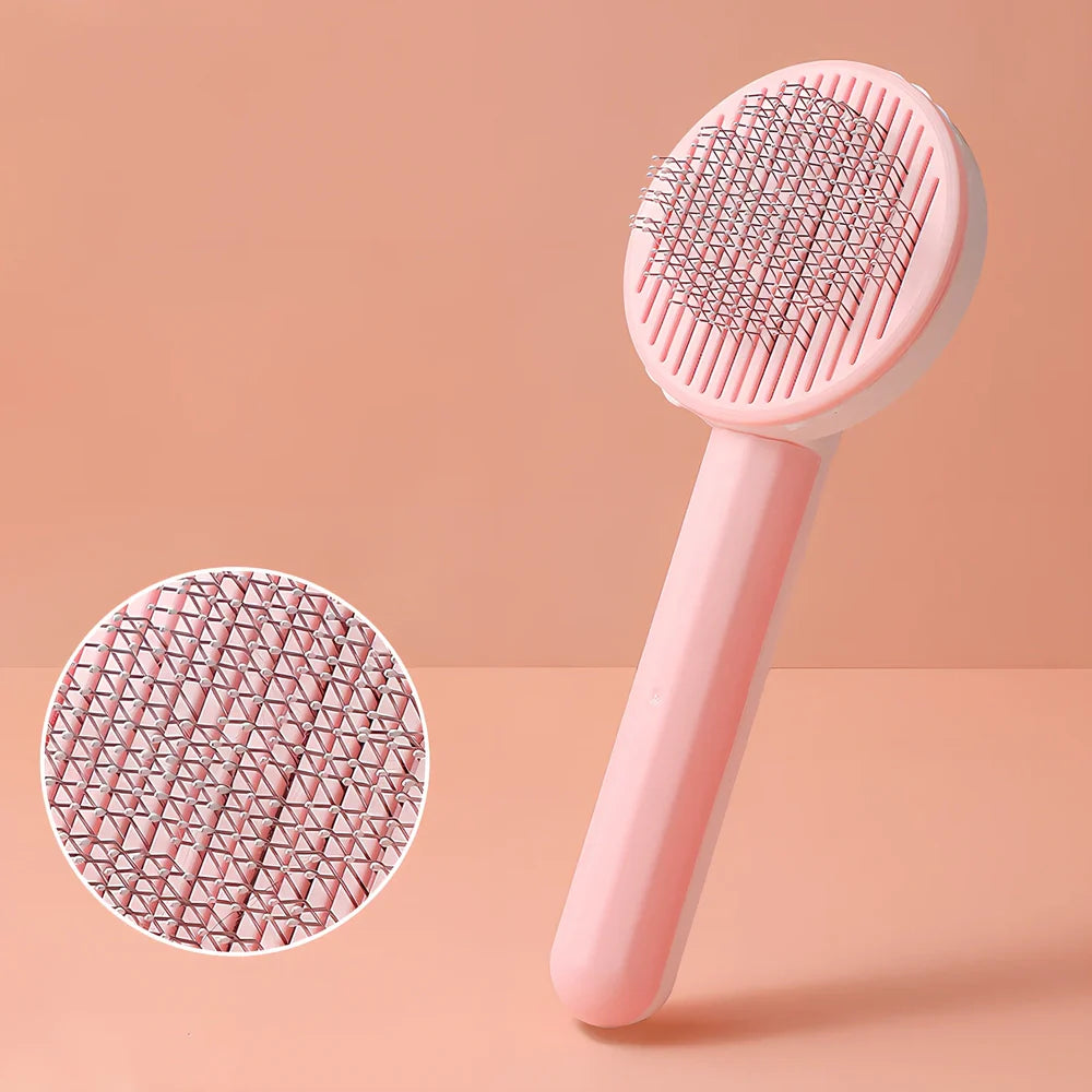 Self-cleaning cat comb with floating needle teeth and built-in hair storage chamber in assorted colours