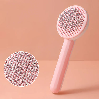 Self-cleaning cat comb with floating needle teeth and built-in hair storage chamber in assorted colours