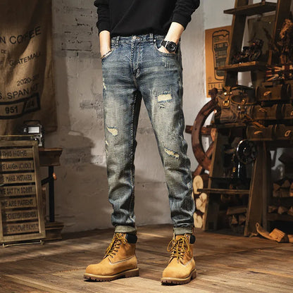 Men's vintage blue straight-leg jeans with a fleece lining and drawstring waist closure.