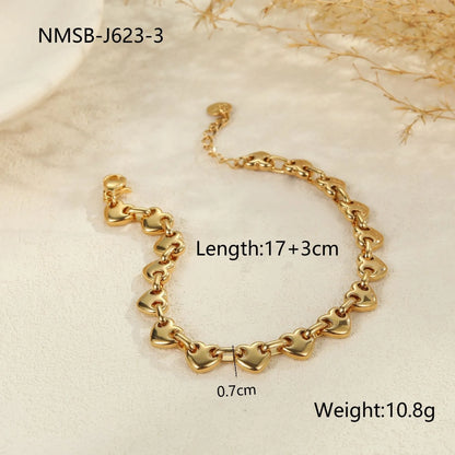 Women's hollow heart bracelet in stainless steel with 18K gold plating showing geometric design