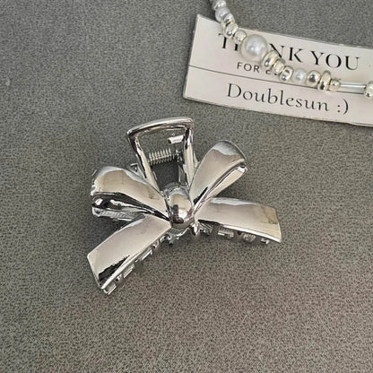 Silver metal hair claw barrette example from a range of 44 Korean-style designs.