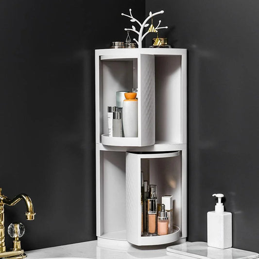 Rotating bathroom makeup storage rack with covered front, disassemblable base, and wall-mounting for space-saving organization.
