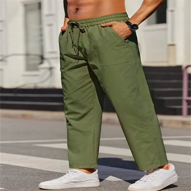 Men's straight-leg linen trousers with an elastic waist in a solid colour