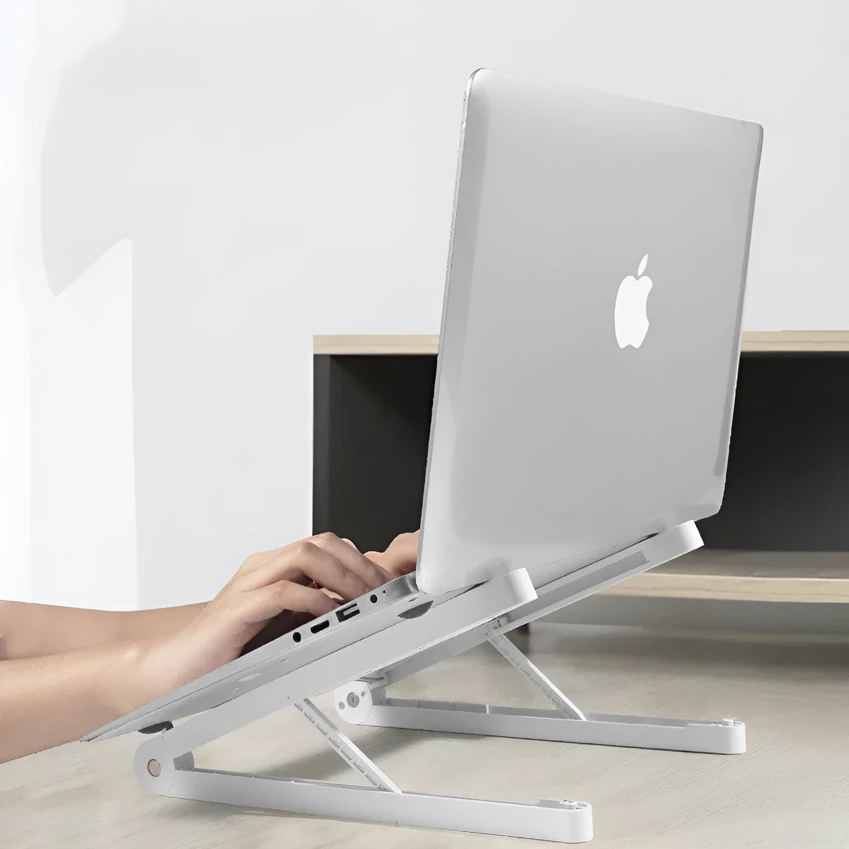 Folding ABS notebook stand in white or black, 32cm wide and 275mm deep, about 25kg load