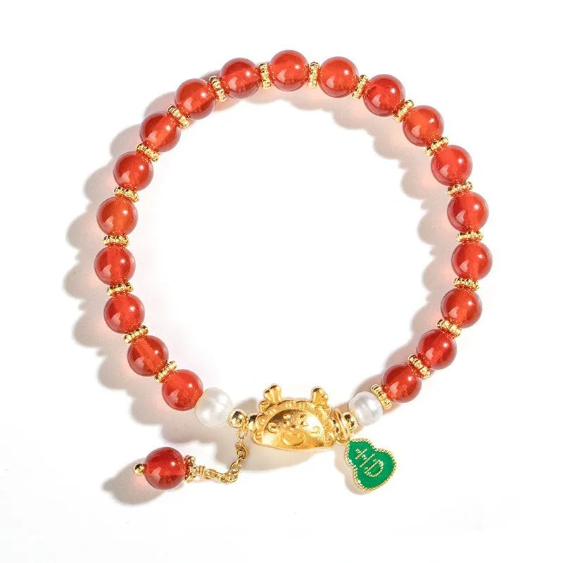 Natural agate and crystal bracelet with 8mm diamond-cut beads on a wrist.
