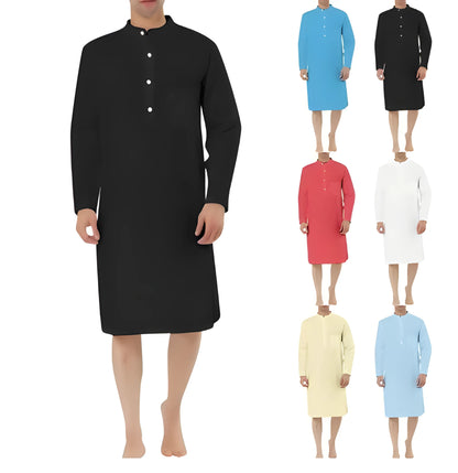 Man wearing a dark blue cotton shirt robe with button front, long sleeves, and side pockets.