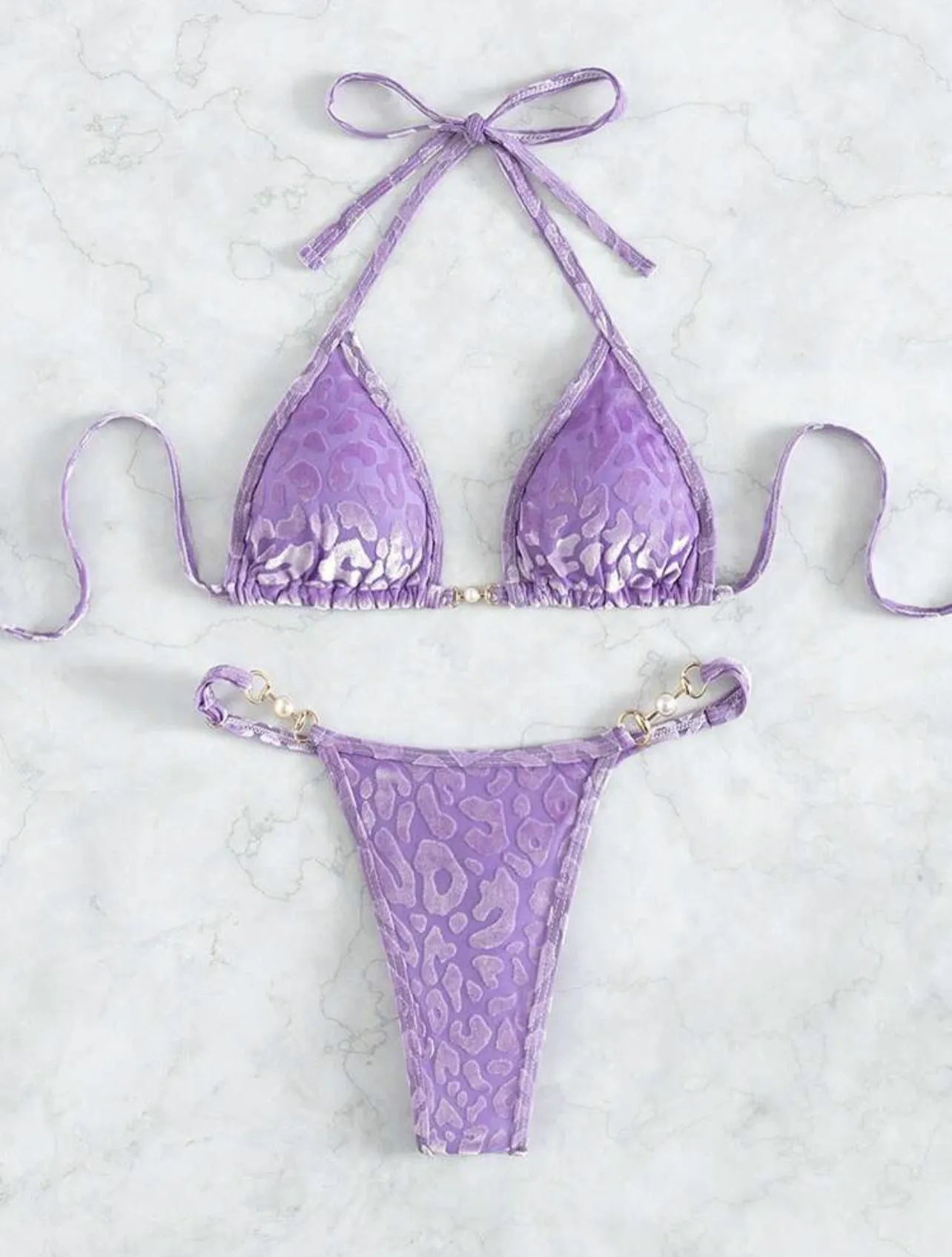 Women's leopard print bikini swimsuit set in various colours including blue and green, shown in triangle and skirt styles.