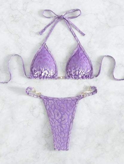 Women's leopard print bikini swimsuit set in various colours including blue and green, shown in triangle and skirt styles.
