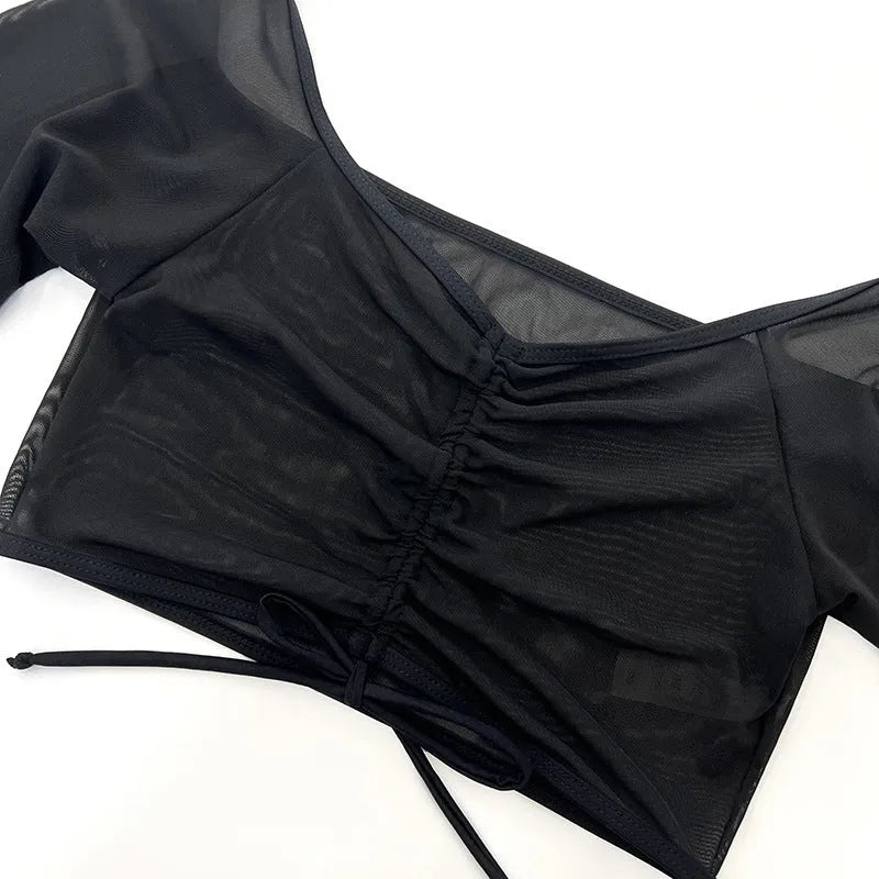 Black mesh long sleeve women's bikini top and briefs, a four-piece swimsuit set.