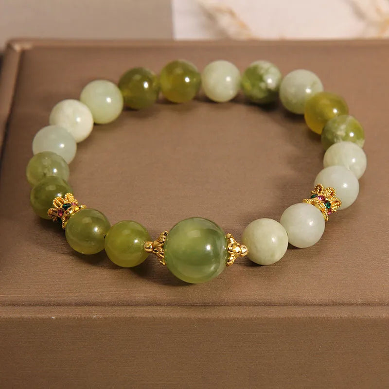 Original design jade bracelet in Xiuyan jade green colour, women's light luxury sweet Mori style jewellery.