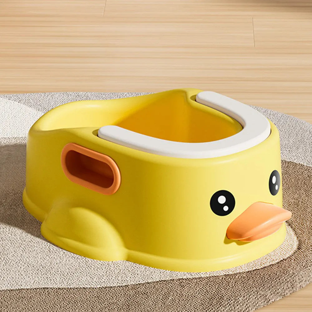 Blue PVC duck-shaped bathtub for washing a small dog, shown on a tiled floor.