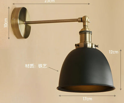 Bedroom wall light with 15cm wide iron shade in pink colour, mounted 20cm projection for soft illumination