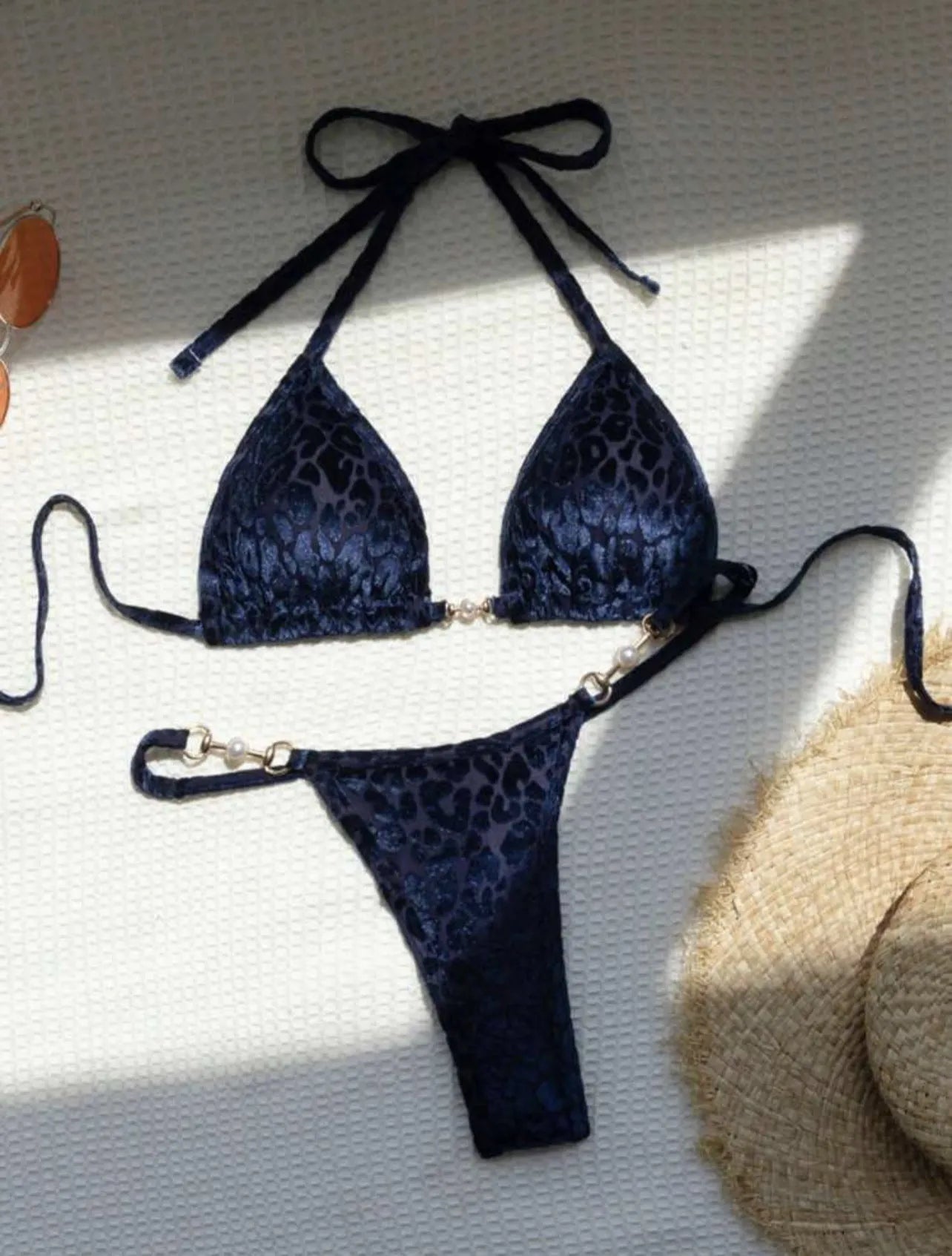 Women's leopard print bikini swimsuit set in various colours including blue and green, shown in triangle and skirt styles.