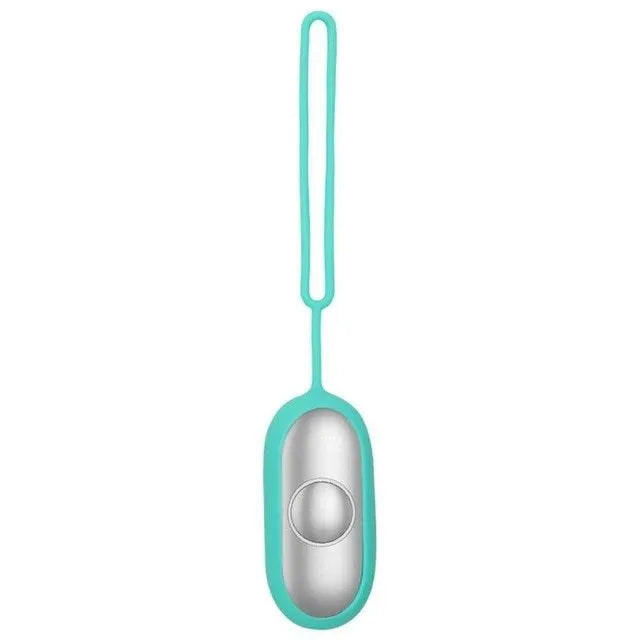 Hand-held micro-current sleep aid device in grey, green, or orange with round button and USB charging port