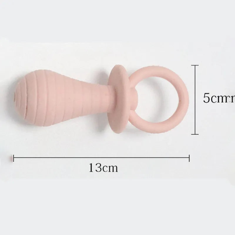 Blue TPR pet pacifier chew toy with squeaker for puppies and kittens on a white background.