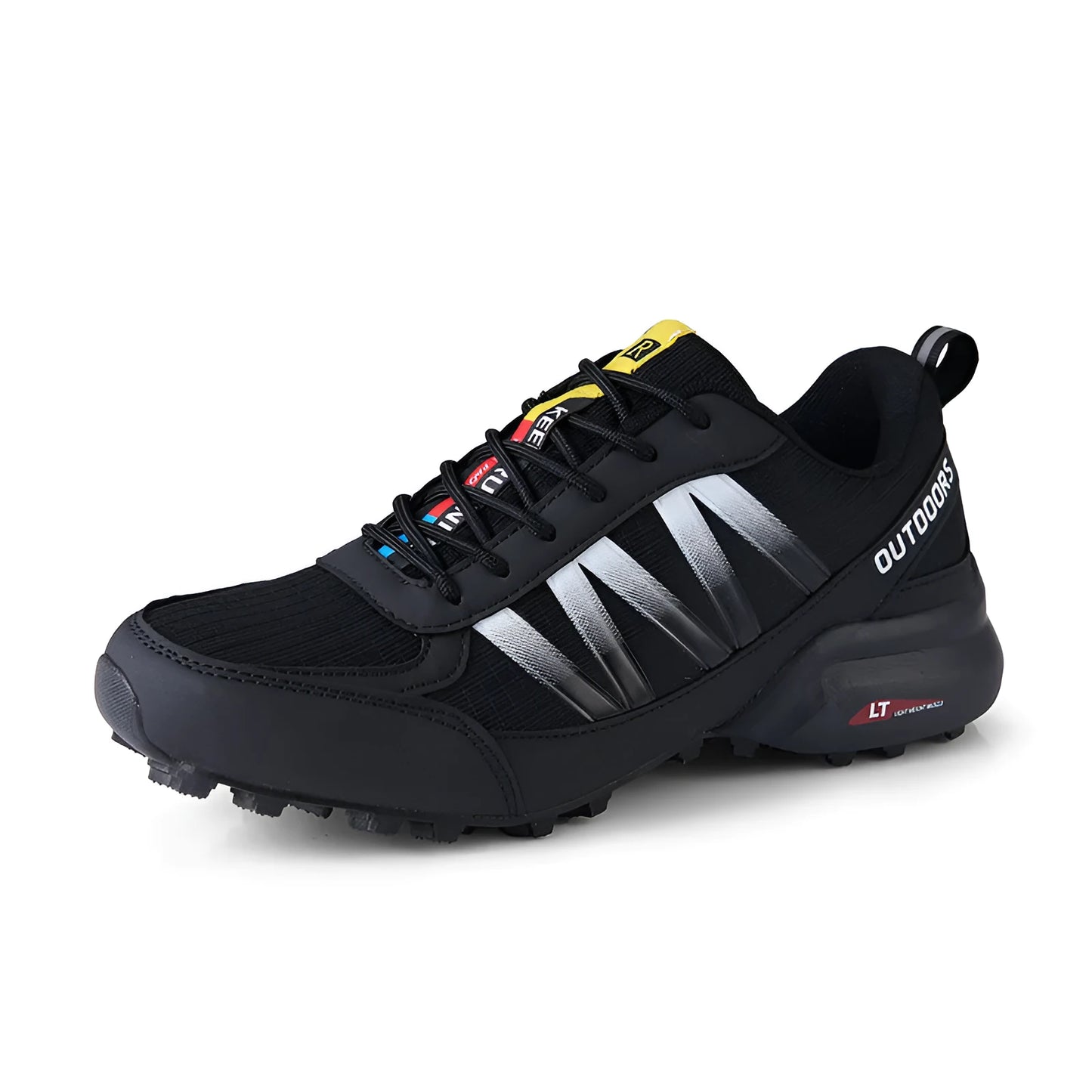 Men's black mountaineering sneakers with a rubber sole and lace-up front on a rocky surface.