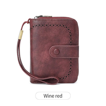 Small leopard print wallet with zipper closure showing stitching details