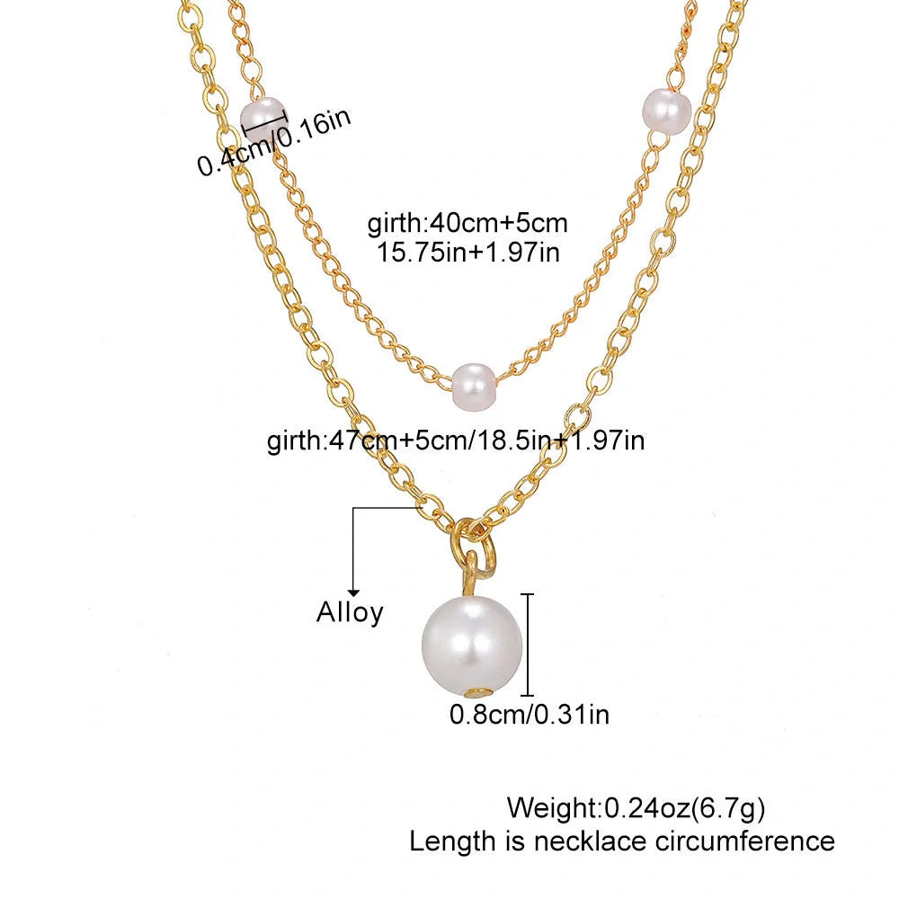 Elegant gold pearl tassel necklace with double-layered design and adjustable chain