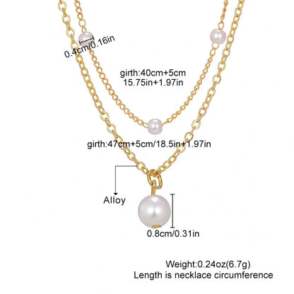 Elegant gold pearl tassel necklace with double-layered design and adjustable chain
