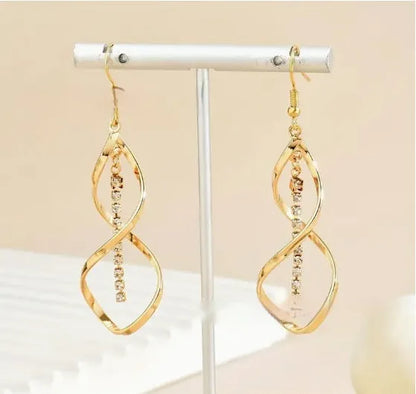 Gold electroplated alloy spiral drop earrings with geometric elliptical design for women