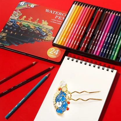 Metal tin box open to show 24 water-soluble coloured pencils with brush tips in assorted colours.