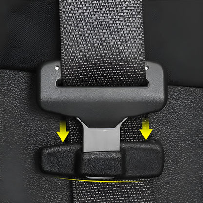 Two black ABS plastic car seat belt stopper clips in clear OPP packaging