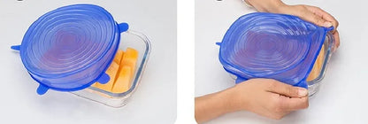 Set of six flexible silicone pot lids in assorted sizes on a kitchen counter.