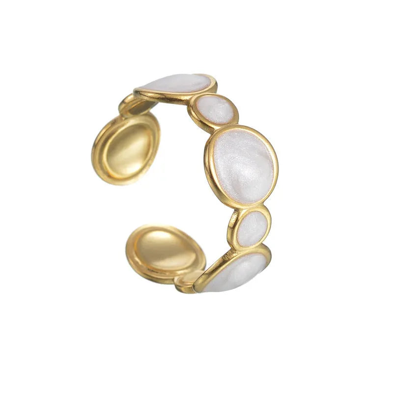 Adjustable geometric stainless steel ring showing angular design and opening mechanism