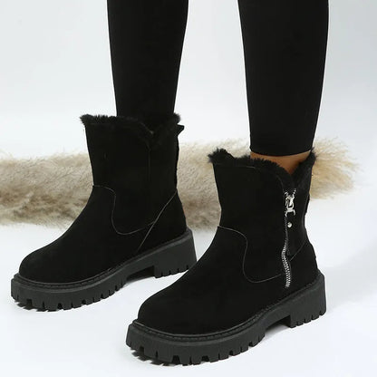 Women's black faux suede high-top snow boots with a side zipper and fur-lined collar.