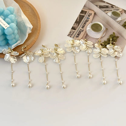 Women's acrylic shell pearl tassel earrings showing four ear clip types and casual style design