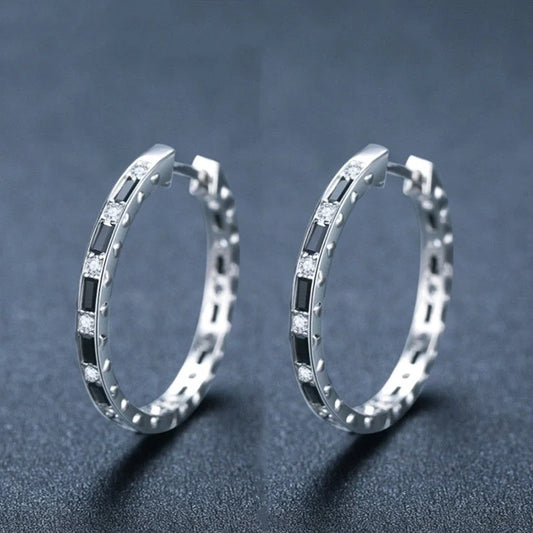 Elegant black zircon earrings featuring a geometric design, crafted from premium copper for a lustrous finish