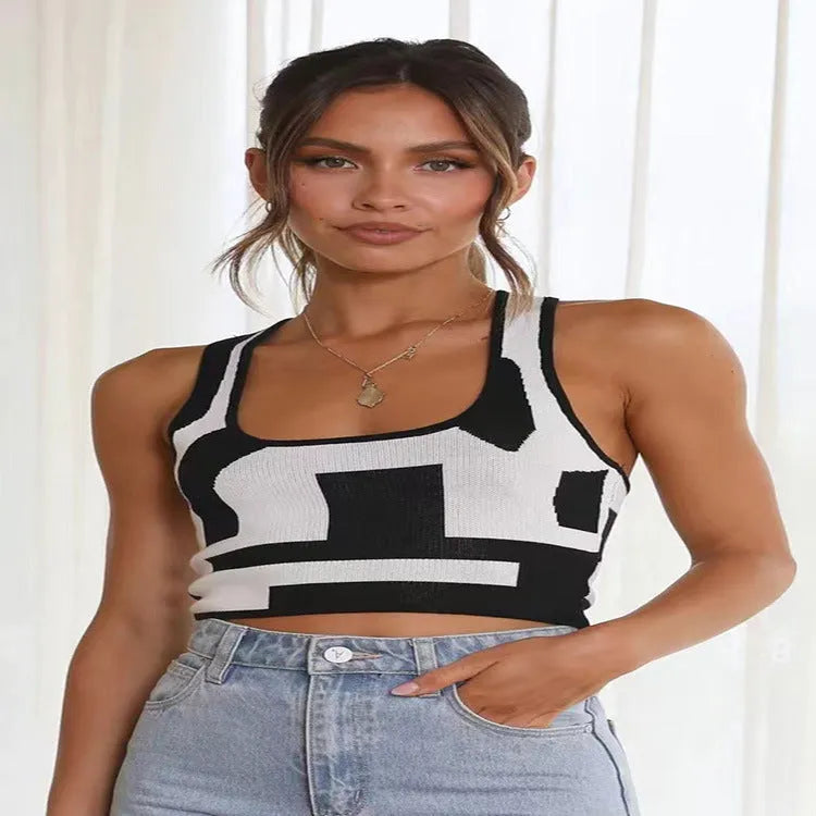 Women's white U-neck slim fit camisole vest with a crop hem, on a mannequin.
