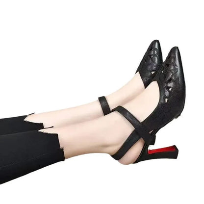 Red women's pointed toe backless sandals with a hollowed toe box and rubber sole