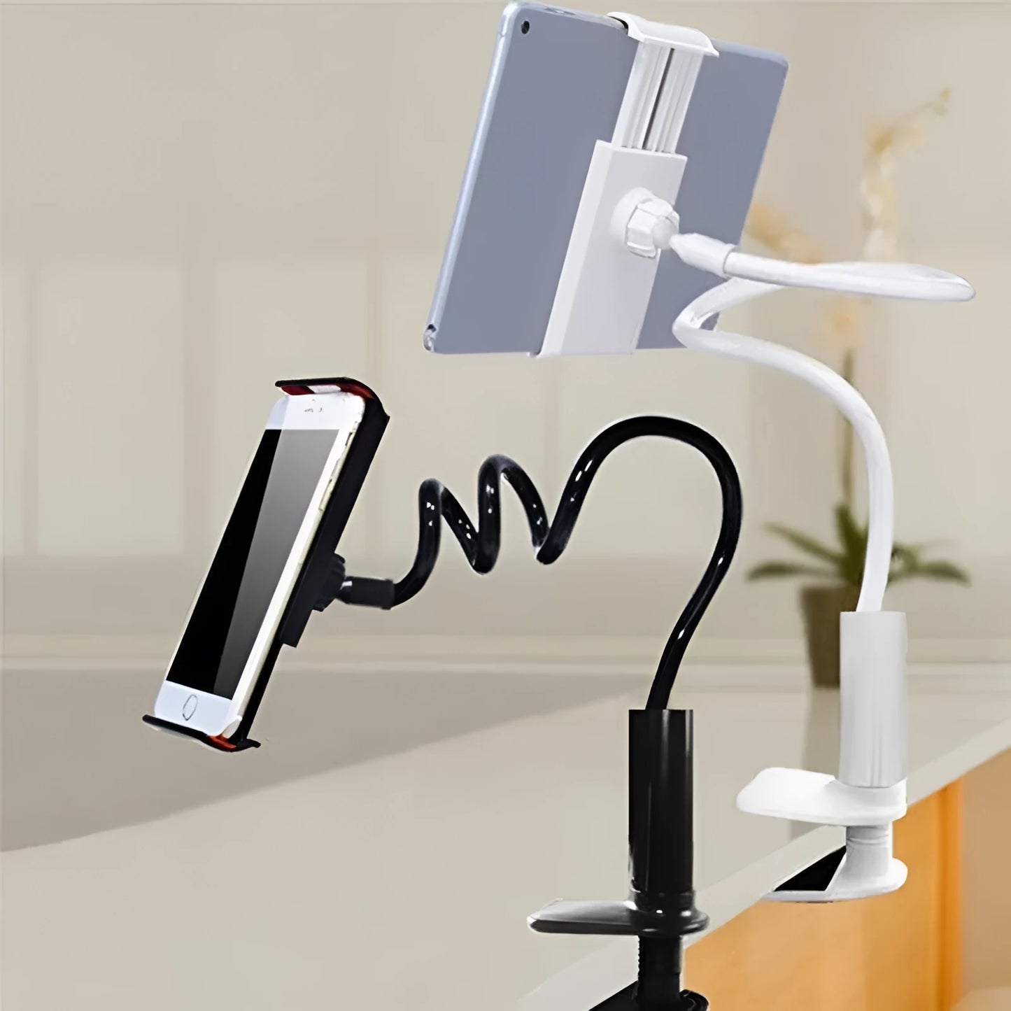 Black flexible mount holder with bendy arm and suction base holding a smartphone at an angle