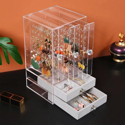 Clear acrylic cosmetic storage box showing makeup organisation with dimensions 13.5x13x24.7 cm