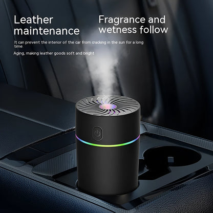Compact car USB humidifier with aromatherapy function showing water reservoir and control buttons