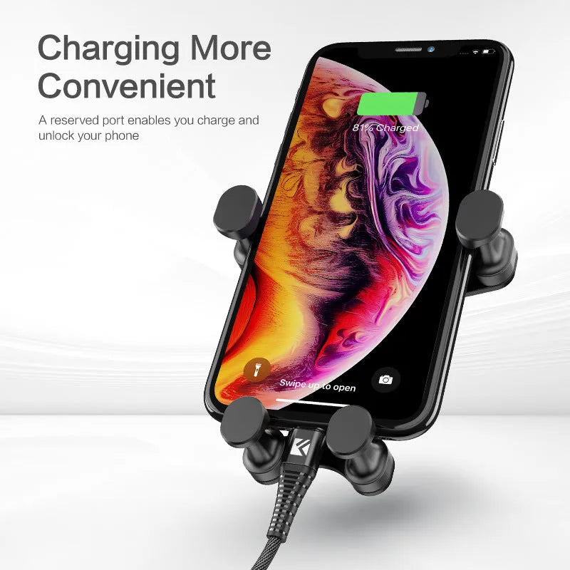 Black gravity car phone holder mounted on a car air vent, showing 360-degree rotation.