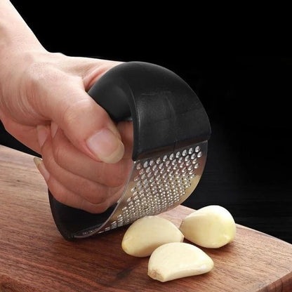 Stainless steel garlic press with non-slip handle for easy crushing