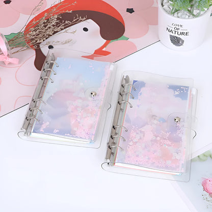 Metal loose leaf binder with PVC cover in blue or pink, showing side storage bag.