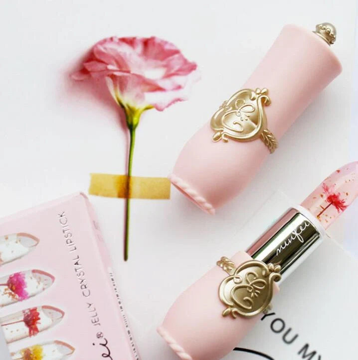 Six Flower Crystal Jelly Magic Lipgloss tubes in Green, Pink, Purple, Red, Rose, and Yellow colours showing high-shine finish