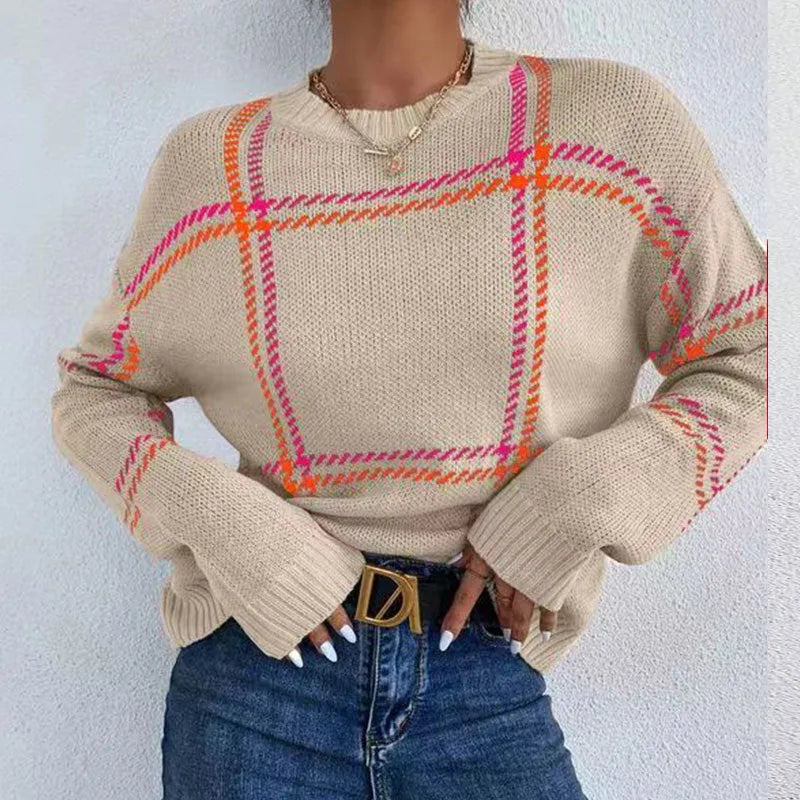 Women's loose-fitting plaid crew neck sweater with apricot, black, beige, red, and green colour-block stripes.