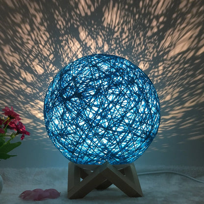 LED rattan table lamp with hand-knit linen shade in various colours